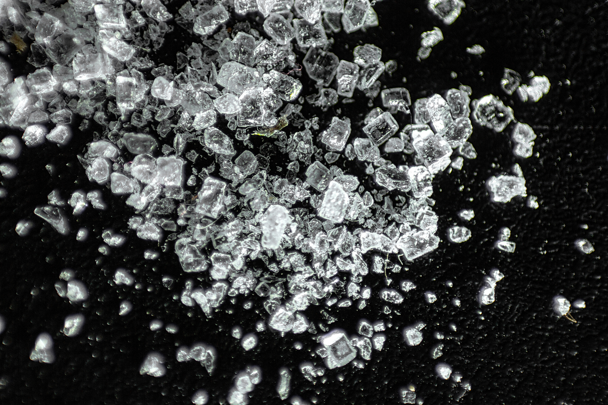Pieces of Crushed Ice on Black Background